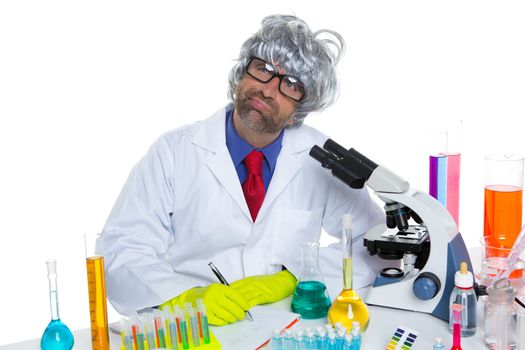 Nerd crazy scientist man portrait working at laboratory with gray hair