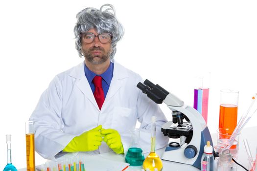 Nerd crazy scientist man portrait working at laboratory with gray hair