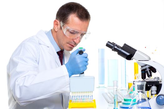 laboratory scientist working at lab with multi channel pipette