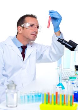 laboratory scientist working at lab with test tubes and microscope