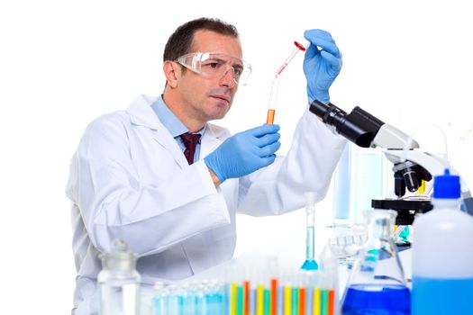 laboratory scientist working at lab with test tubes and microscope