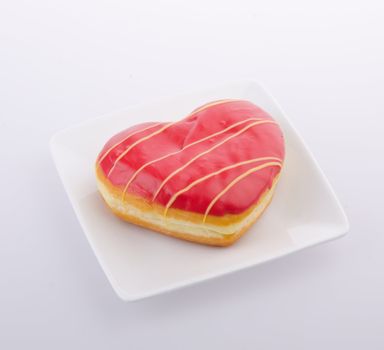 Donut, Heart Shaped Pastry on the background