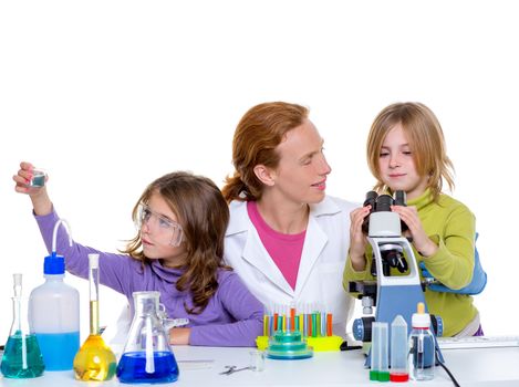 children girls and teacher woman at laboratory on school chemical class