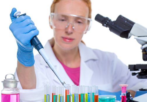 chemical laboratory scientist woman working with pipette and test tubes