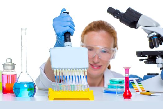 chemical laboratory scientist woman working with multi channel pipette