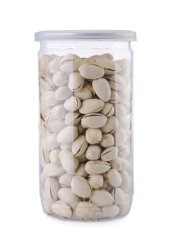 pistachio nuts in jar on the background