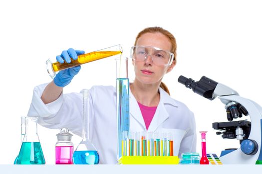 chemical laboratory scientist woman looking at test tube