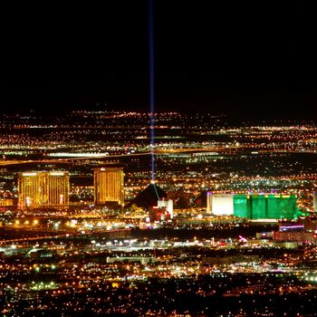 Las Vegas, USA - November 26, 2011: Bright lights of hotels and casinos at the south end of the Las Vegas Strip. The Strip is about 4 miles long and is seen here from the Frenchman Mountain summit.