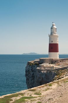 Lighthouse in Gibraltar, blue sky and sea
