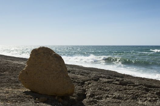 Sandstone boulder in section a of the rocky portuguese coastline, Portugal