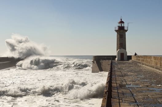 Historic lighthouse of Felgueiras in the river mouth of Douro, Porto, Portugal