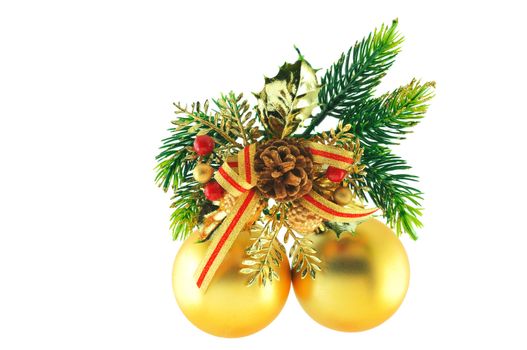 golden balls, cone spruce, fir and sprigs to decorate for Christmas against a white background