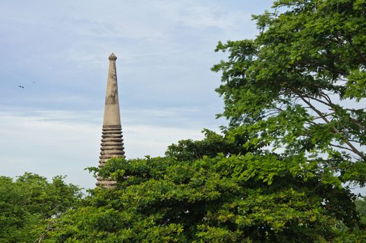 Top of ancient pagoda in ruined old temple at Wat Yai Chai Mongkol temple in Ayutthaya, Thailand.