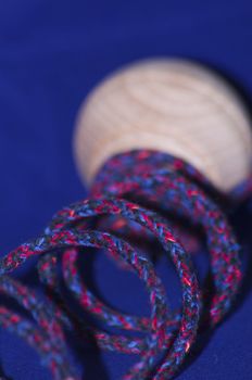 Red and blue rope with a whirligig