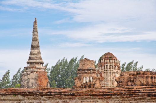 Ancient pagoda in ruined old temple at Ayutthaya historical park, Ayutthaya, Thailand.