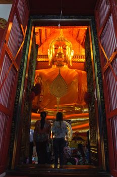 Big gold Buddha statue at Wat Pha Nan Cherng temple belonging to the public, Ayutthaya, Thailand