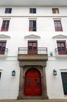 A red and white colonial building in Popayan, Colombia.