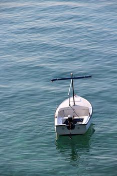 Clear sea water of Adriatic sea and small boat, Croatia