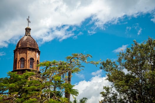 Dome of a church in set against a beautiful blue sky