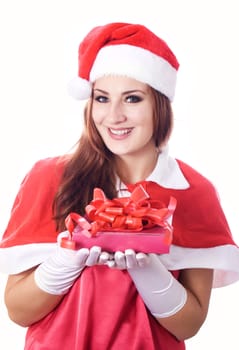 Standing indoors and holding christmas gift