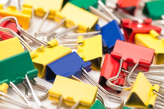 Multicolored Paper Clips, closeup on white background