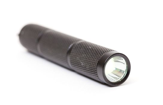 LED flashlight, on white background