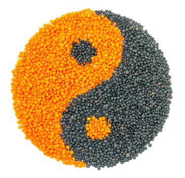 Orange and Black Lentil forming a yin yang symbol, isolated on white