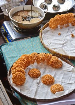 Powder fried dessert sold on the floating market in Ayuthaya, Thailand