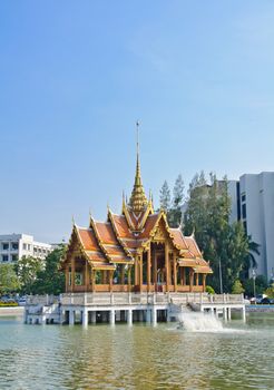 Beautiful Thai Buddhism palace in the water at Ramkamhang university, Bangkok, Thailand