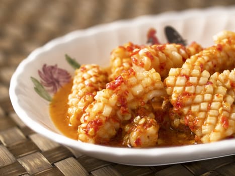 close up of a bowl of sambal belecan squid