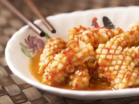 close up of a bowl of sambal belecan squid