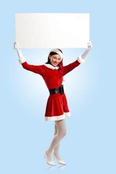 Portrait of a santa girl with a blank banner