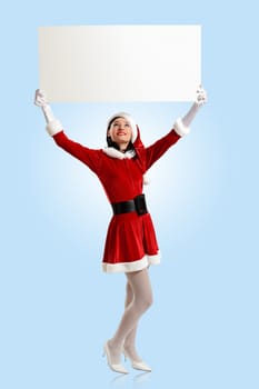 Portrait of a santa girl with a blank banner