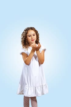 Portrait of an adorable preschool age girl wearing a Christmas holiday outfit