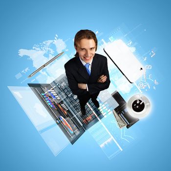 Modern technology illustration with computers and business person