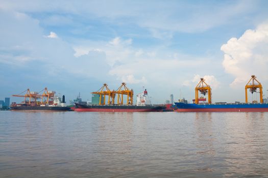 Industrial shipping port at day in Bangkok, Thailand
