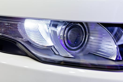 Detail of a beauty and fast car with headlight