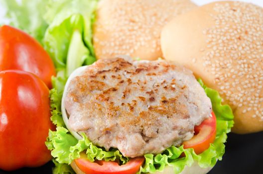 fried pork with fresh vegetable and bun