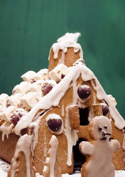 Sweet Gingerbread House with sugar snow