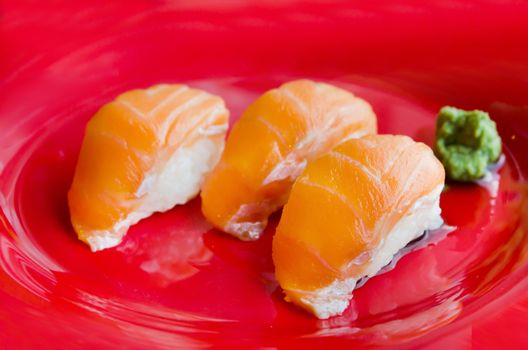 salmon sushi , japanese style cuisine .