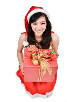 Santa woman  holding a gift box isolated on white background