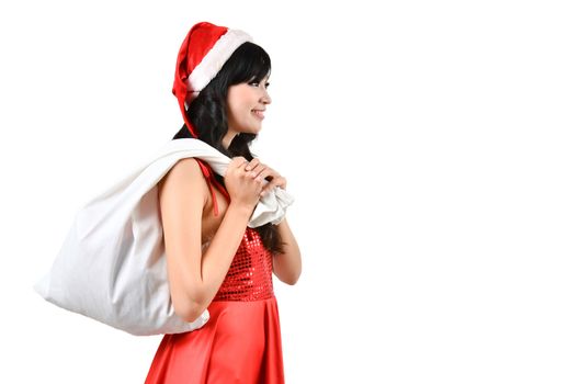Santa woman  holding a white bagisolated a on white background