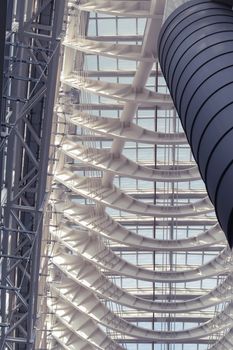 vertical fragment of metallic structure of modern building roof