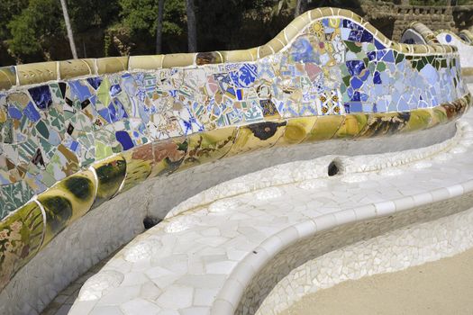 famous curved mosaic bench in Park Guell, Barcelona