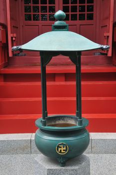 Traditional Buddhist ash-urn close to Japanese Temple