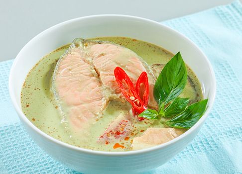 salmon in concentrated green curry in asian style