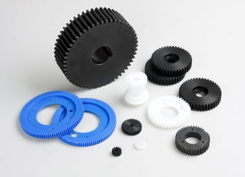 Plastic gears wheel the spare parts in the engine machine
