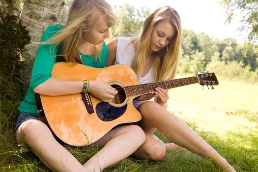 Two girls are having fun in the summer sun