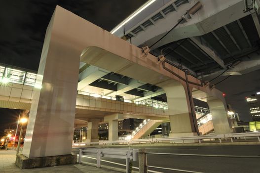 huge highways structure background with night city illumination, Tokyo, Japan