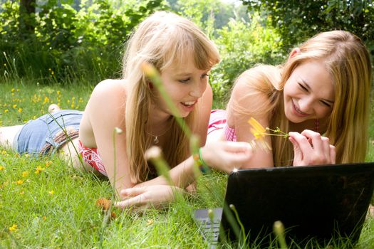 Two girls are having fun in the summer sun